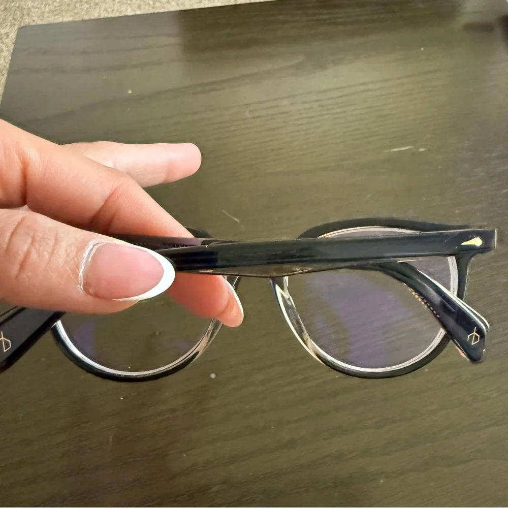 Rag & Bone eyeglasses with a black frame RNB3029 YRQ 140